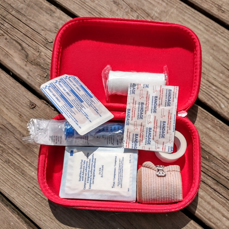 the inside of the hard pencil cases showing how medical supplies can fit
