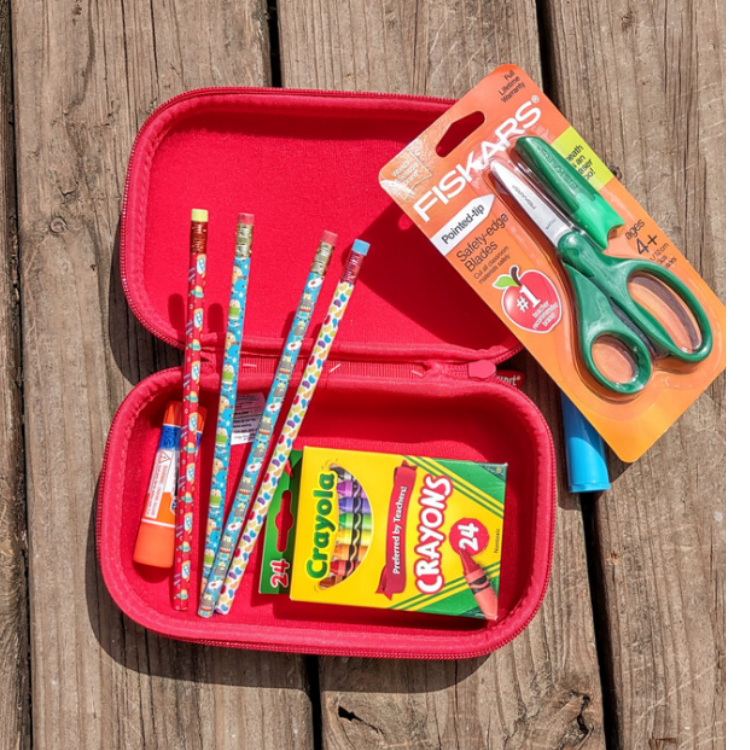 the inside of the hard pencil cases showing how school supplies fit