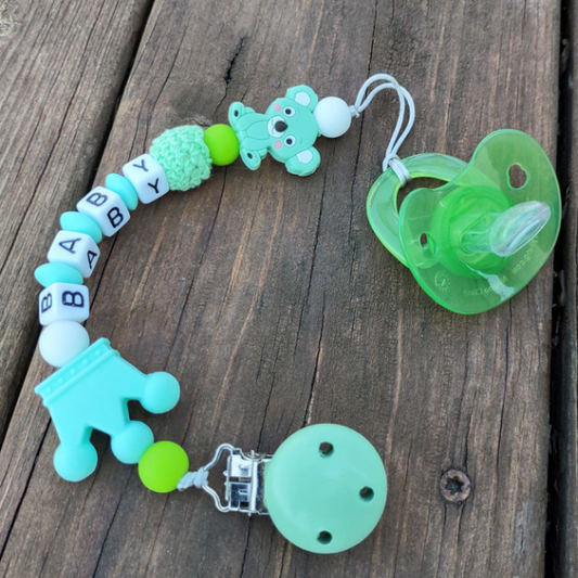 Mint green teething bear pacifier clip