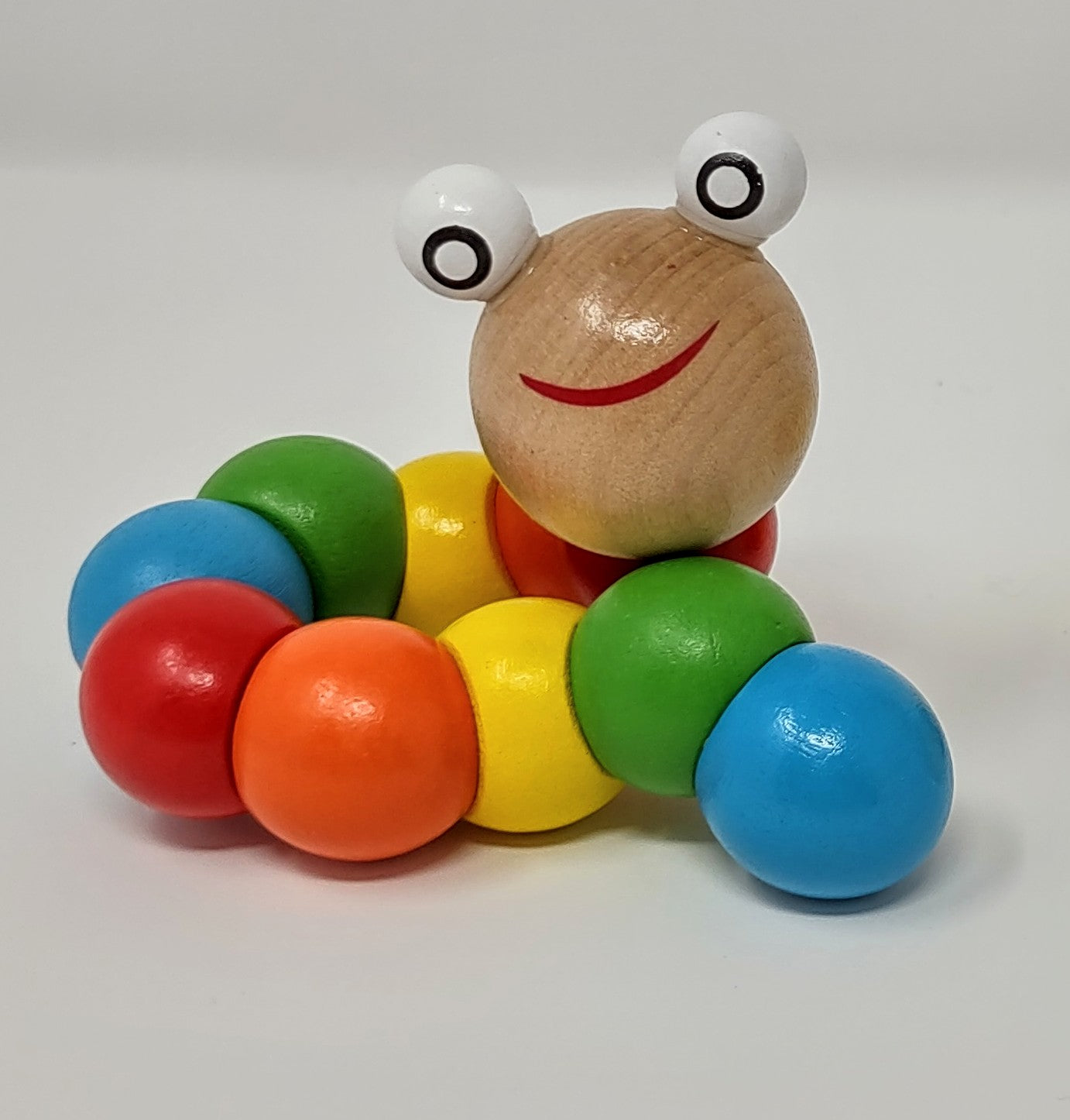 vibrant colored wooden caterpillar